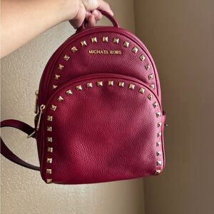 Michael Kors Burgundy Backpack with Gold Studs